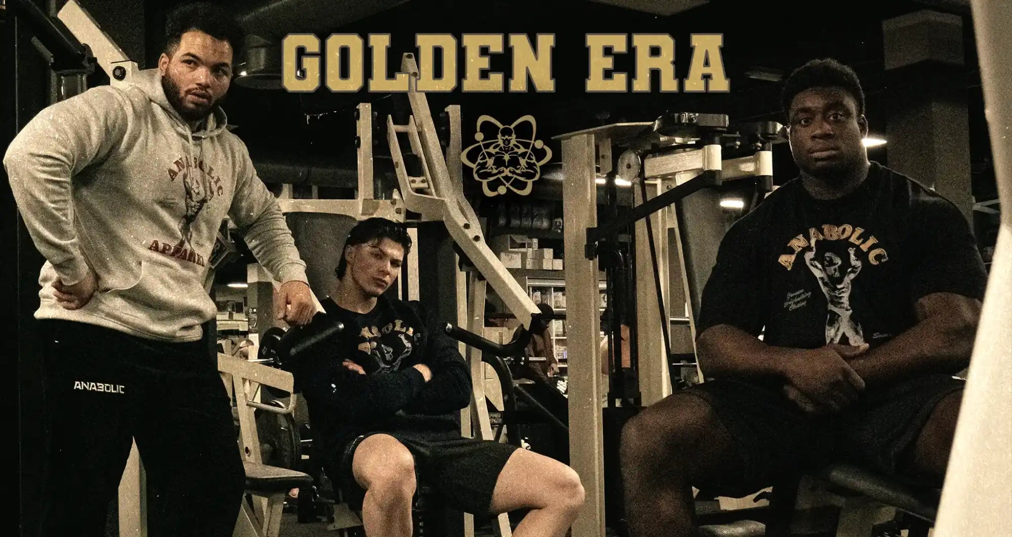 Three muscular men in a gym.